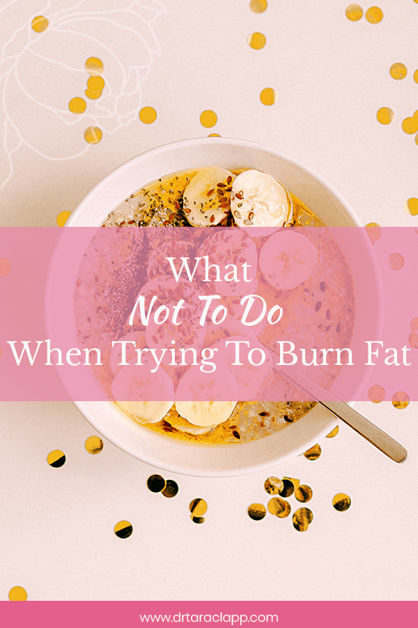 Bowl of cereal topped bananas on pink table with gold confetti - What Not To Do When Trying To Burn Fat Blog Article by Dr. Tara Clapp, ND